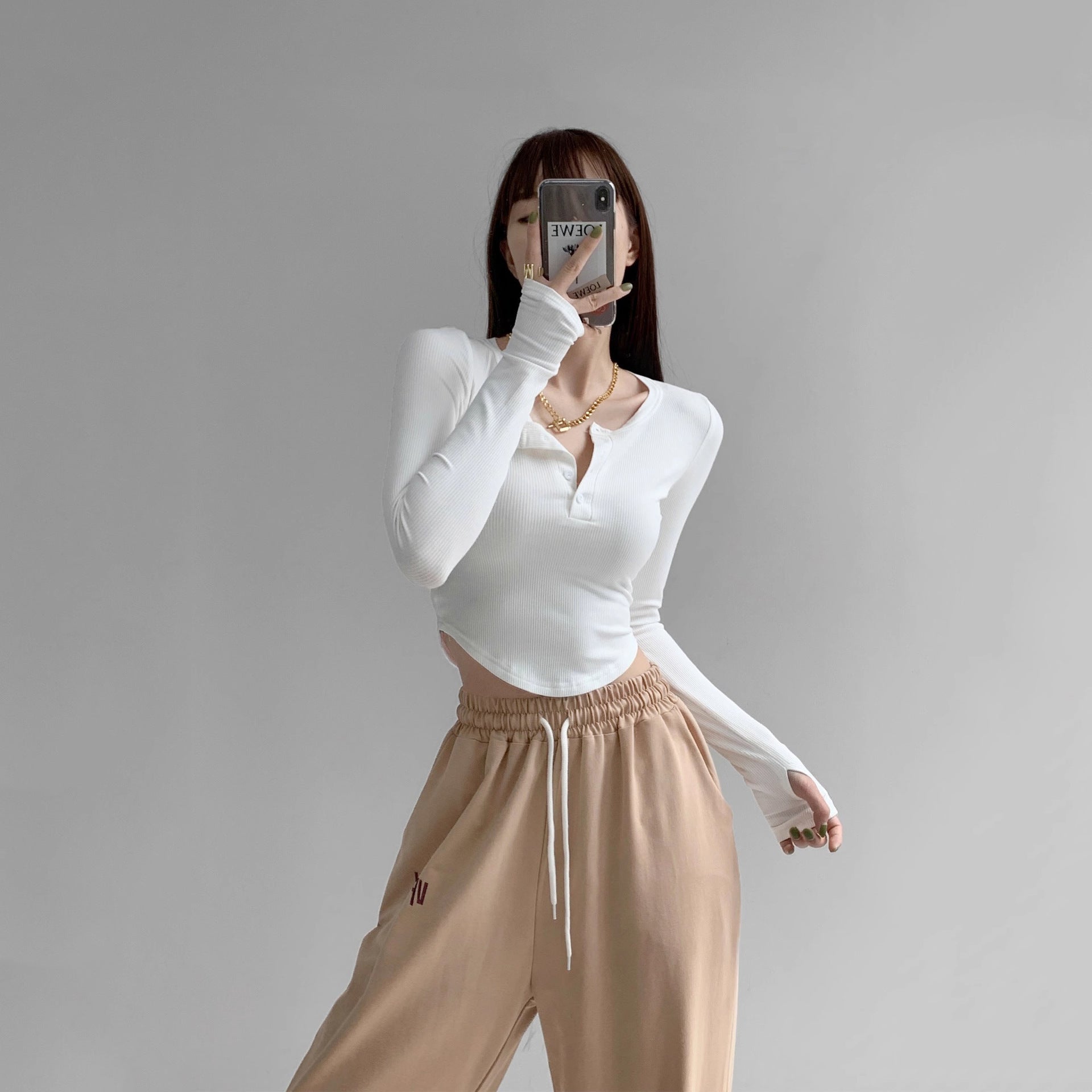 Mirror-selfie full-body shot of white Collar Femboy Long-Sleeve Tee, femboy clothing online.