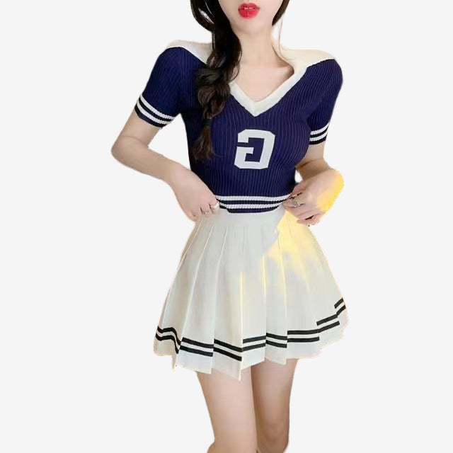 A close-up shot of a femboy outfit displayed on a mannequin, showcasing a light-colored, form-fitting top with delicate lace accents. The camera angle is slightly tilted from the right, highlighting the fabric texture and the slim cut of the clothing. The background is solid white, keeping the focus entirely on the outfit. Perfect representation of trendy femboy clothing, femboy clothes, and fashionable femboy outfits.