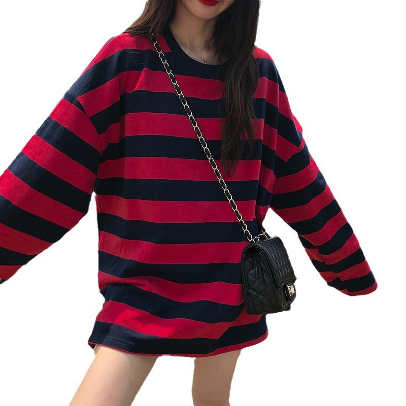 Trendy red and blue striped long sleeve sweatshirt for femboys, ideal for creating vibrant and youthful femboy fashion looks.