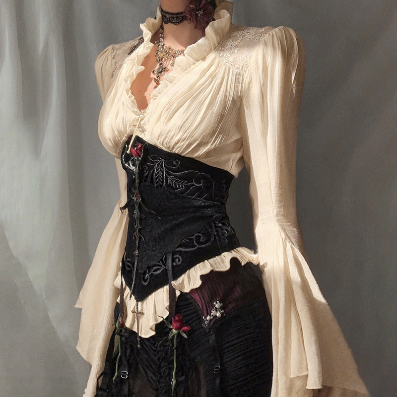 White femboy Victorian ruffle V-neck blouse with flared bell sleeves and lace trim, dark aesthetic from FemboyBox
