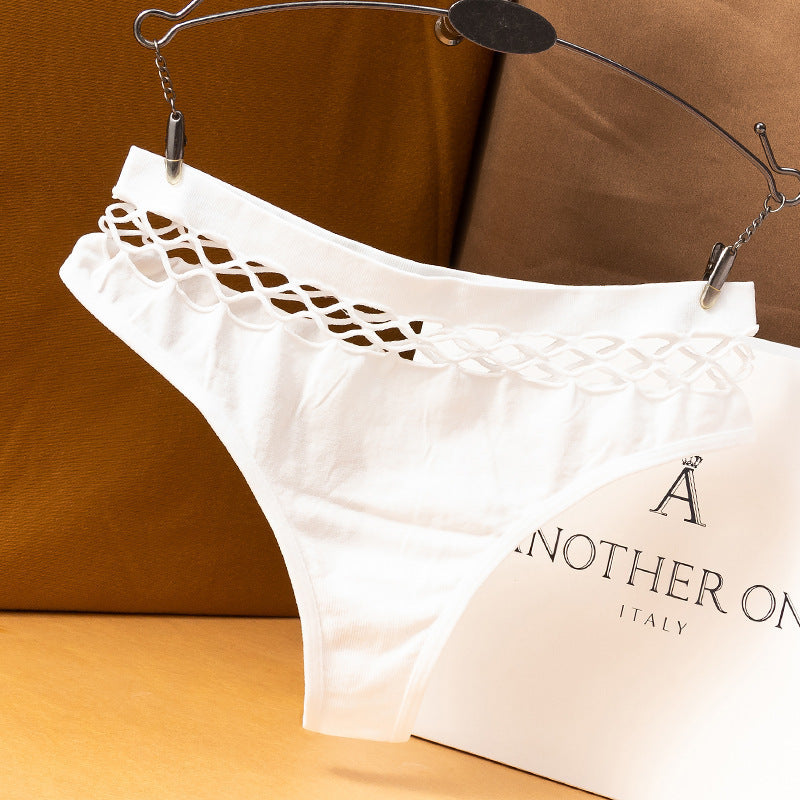 White fishnet femboy thong featuring sheer lattice waistband, minimalist flat lay display