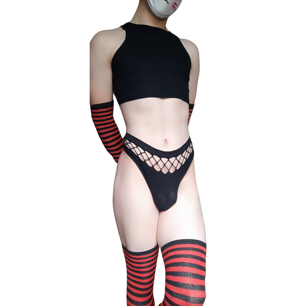 close-up front shot, straight-on angle of fishnet femboy thong in black, shown on model with soft studio lighting and clean white background, highlighting mesh cutout waistband and minimal silhouette for femboy clothing and femboy outfits in a monochrome palette