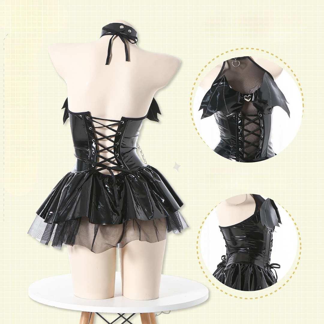 Black gothic devil femboy lingerie set components flatlay, corset tutu skirt and accessories