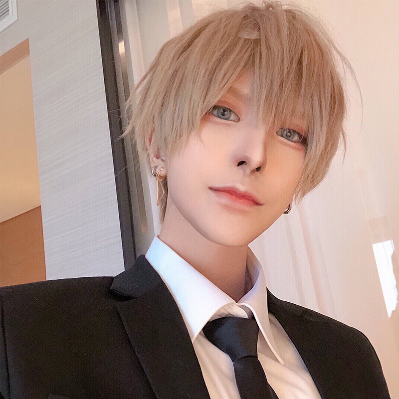 Short bangs femboy wig in light blonde shade, close-up angled portrait showing realistic fibers and layered fringe, clean androgynous haircut suited for femboy clothing and femboy fashion looks.