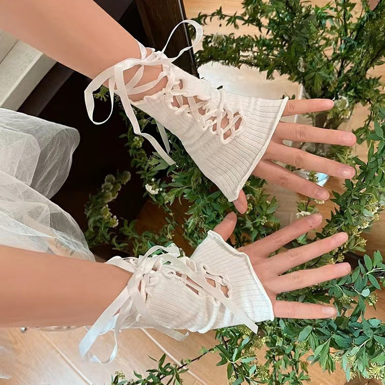 White Lolita Lace-Up Gloves with delicate ribbon ties, perfect for summer outfits and elegant cosplay looks.