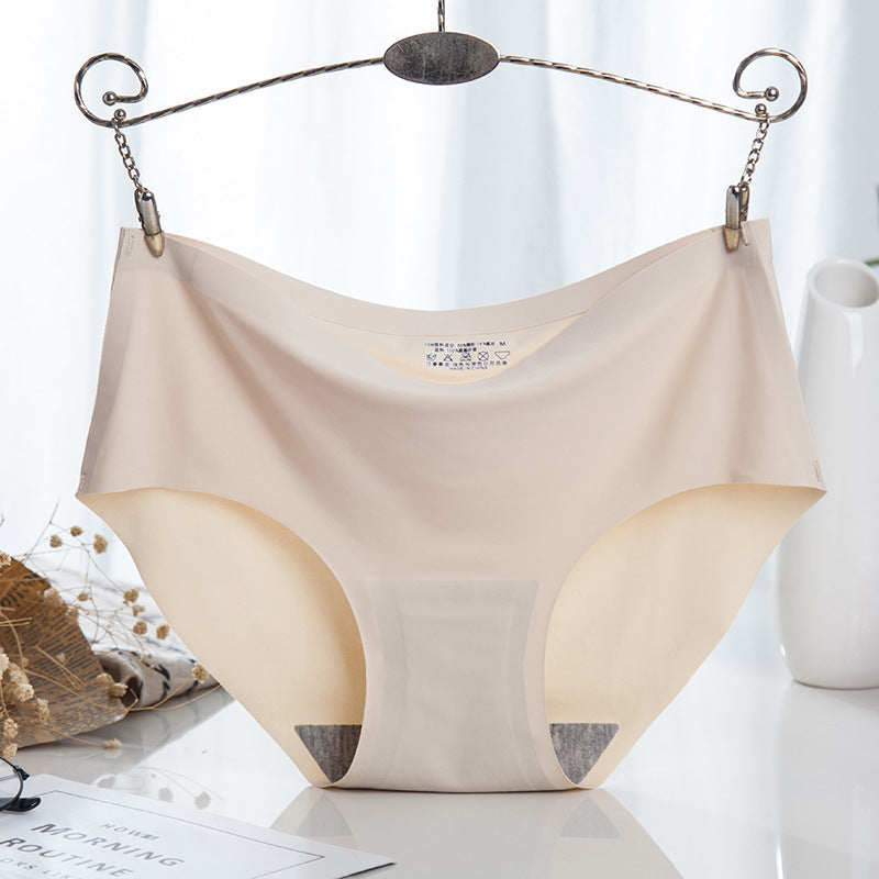 Beige seamless femboy underwear displayed on a decorative hanger, emphasising breathable fabric and elegant design in soft lighting. Front view, Light background, close up.