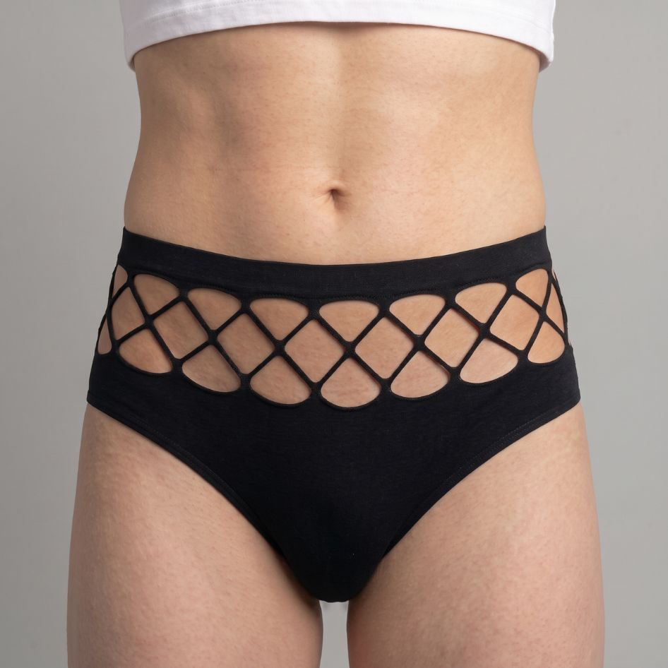 Black high-waist femboy panties with lattice cutout band under the waistband, full-coverage brief, front view on model | FemboyBox