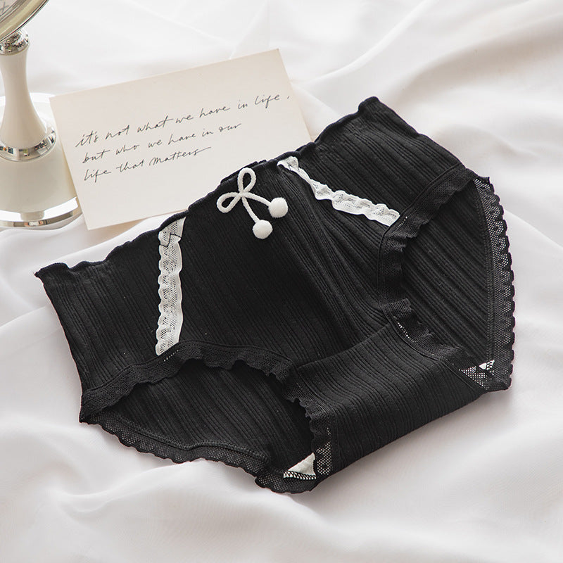 Top-down view of black Lolita Bowknot Panties with intricate white lace detailing and a decorative front bow, essential for femboy fashion statements.