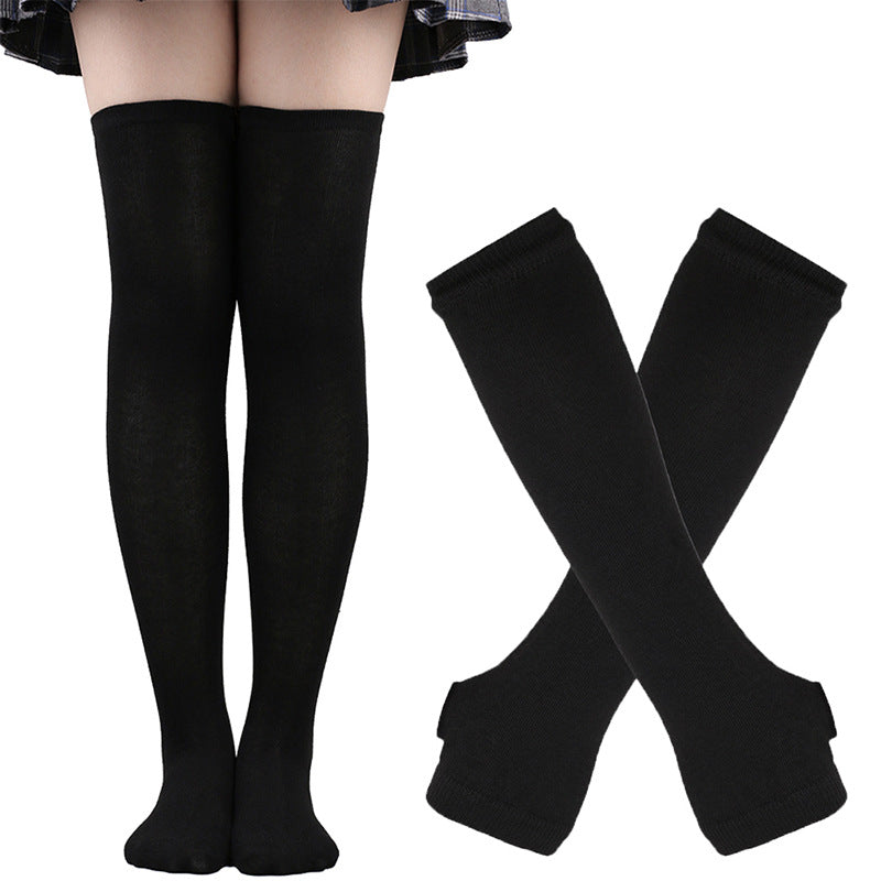 Plain black knee-high socks available at Femboy Box, a staple for any femboy clothes collection, providing sleek style and comfortable fit.