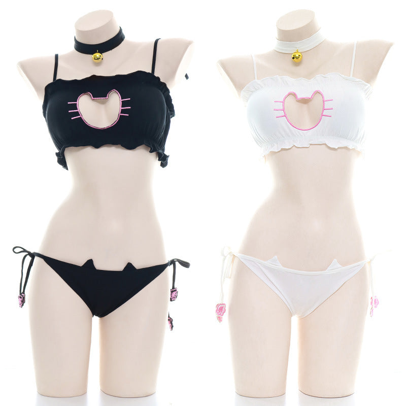 Black and white cat paw femboy lingerie set with heart cutout bralette and side-tie bikini bottoms from FemboyBox