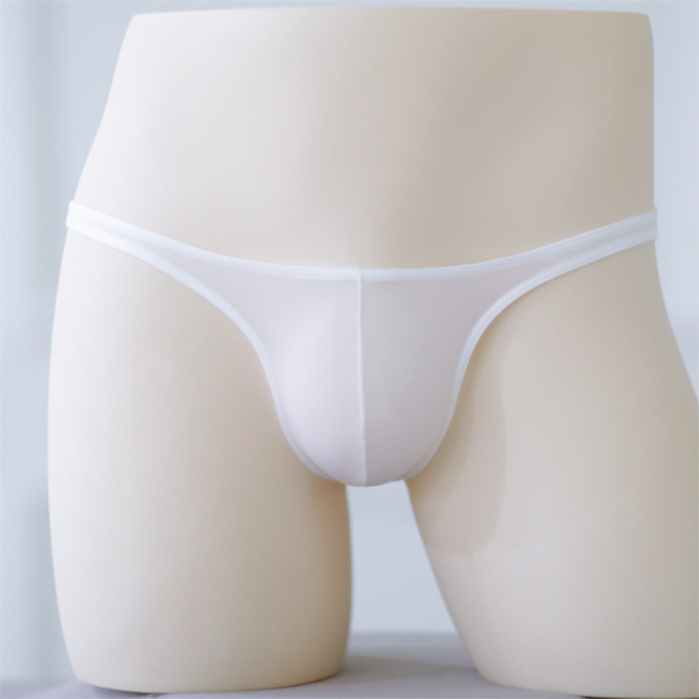 Front view of a white see-through femboy G-string displayed on a mannequin, emphasizing the clean and minimalist design. Perfect for promoting femboy clothing and bold femboy outfits.