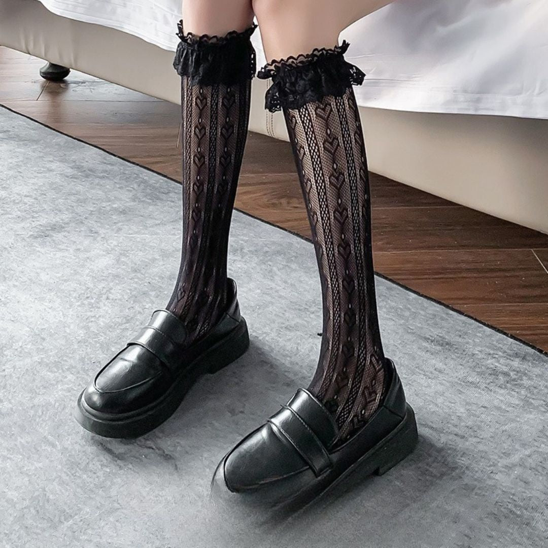 Black Japanese JK style lace knee high stockings for femboy outfits, sheer ruffle top from FemboyBox