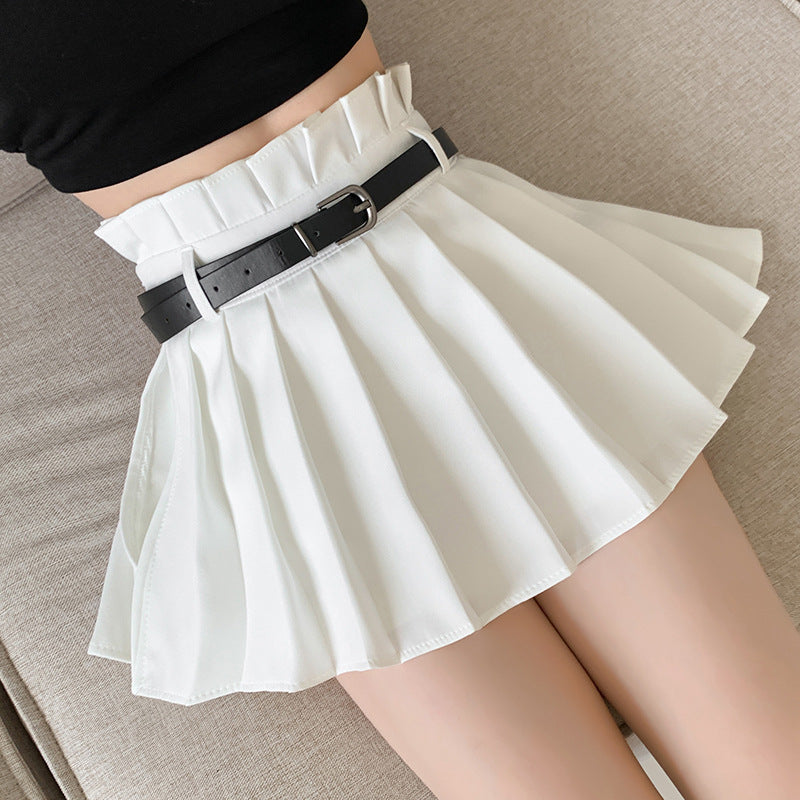 Detail shot of a white pleated femboy skirt with a black belt, highlighting the soft and elegant design perfect for femboy outfits.