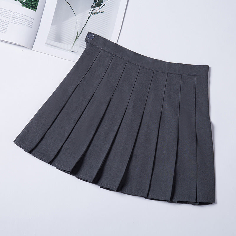 Sleek black high-waist pleated mini skirt displayed on a flat surface, highlighting the versatile design ideal for femboy clothing collections.