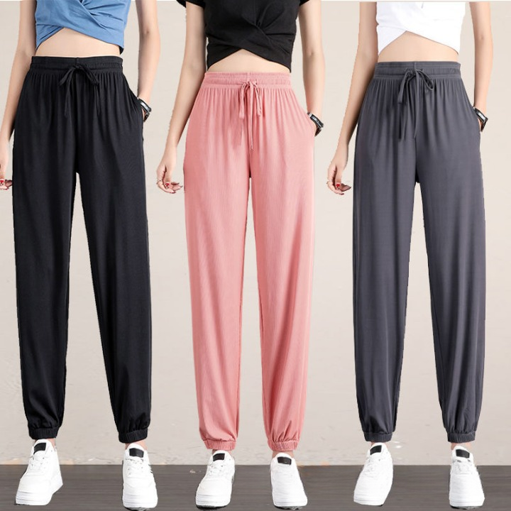 A stylish lineup of Femboy Yoga Pants in black, pink, and grey, showcasing their relaxed fit and casual versatility for femboy outfits.