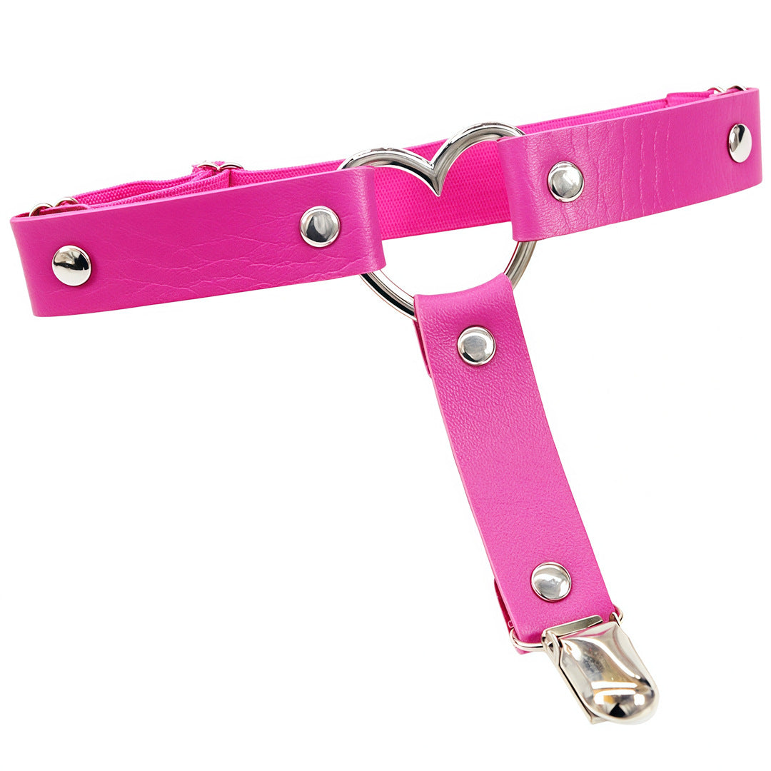 Hot pink leather heart femboy thigh garter with silver heart ring and snap fasteners, cute femboy clothing accessory on white background