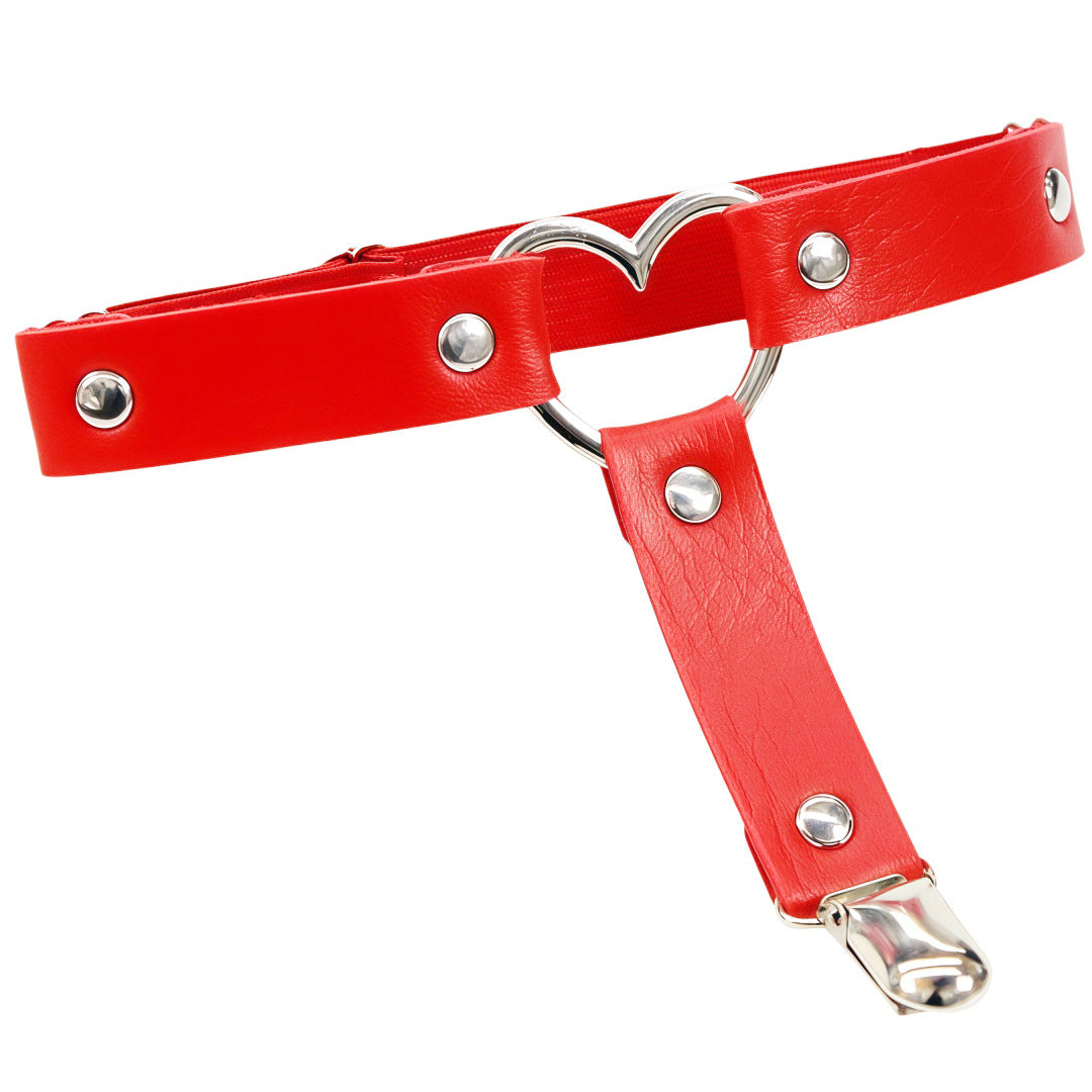 Red leather heart femboy thigh garter with metal heart centerpiece and adjustable elastic band, bold femboy fashion statement piece