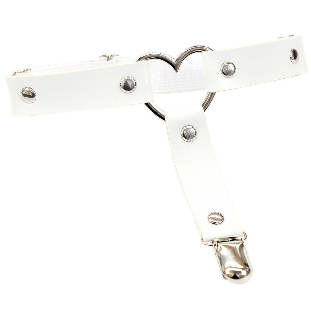 White leather heart femboy thigh garter with silver heart ring and clean minimalist design, elegant femboy fashion accessory