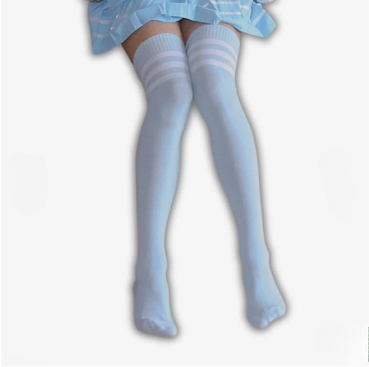 Pastel blue striped thigh high socks worn on legs, soft kawaii style femboy clothing with smooth opaque fabric, front-facing studio shot on white background