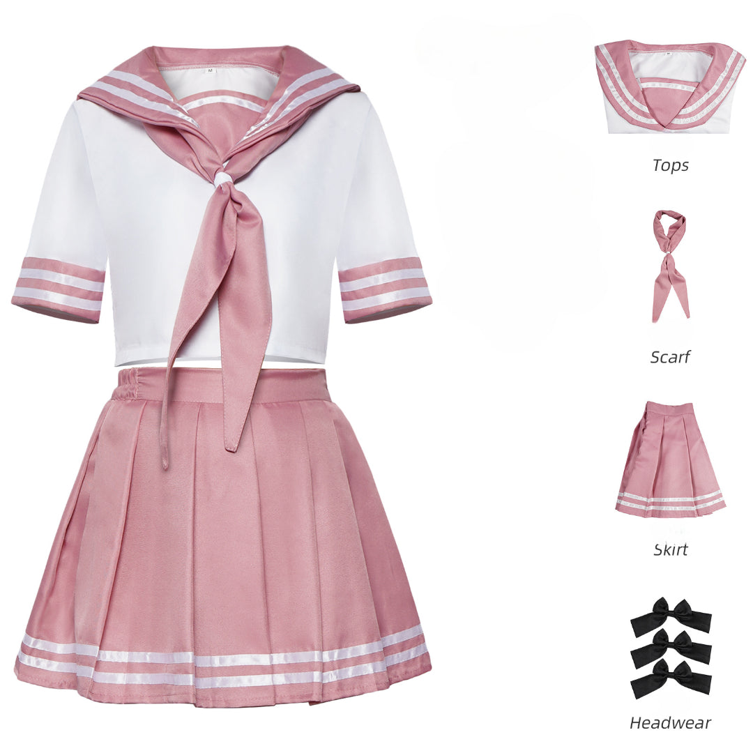 Flat lay top view showing components of Astolfo femboy sailor outfit – includes pink pleated skirt, sailor top, scarf, and bow headwear – femboy outfit aesthetic