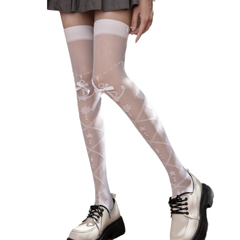 Side view of white Lolita Femboy Thigh Highs with bow accents, styled with chunky shoes and pleated skirt, highlighting a delicate lace pattern, perfect for femboy clothing and femboy outfits.